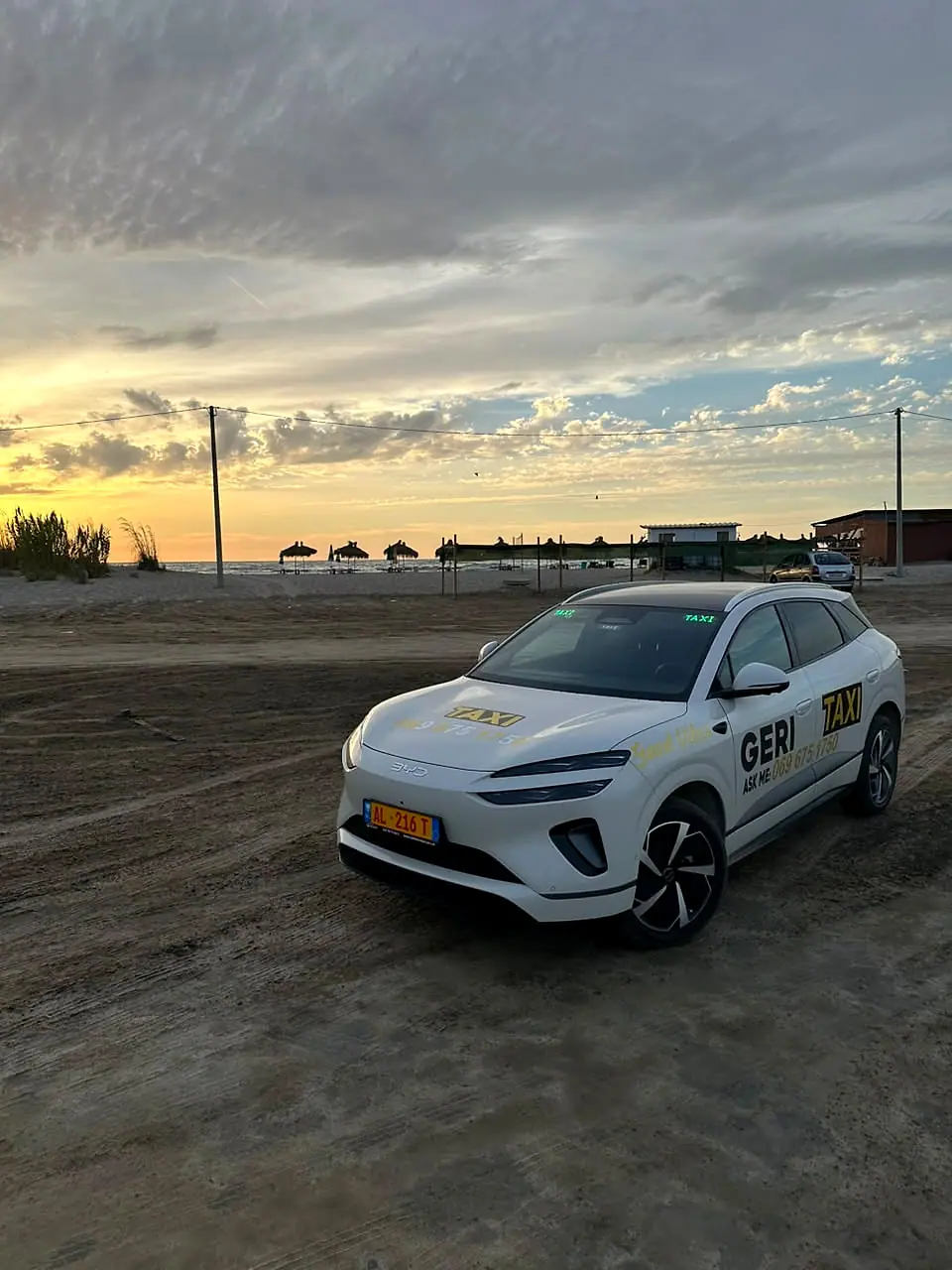 Sunset on the beach with Geri's taxi
